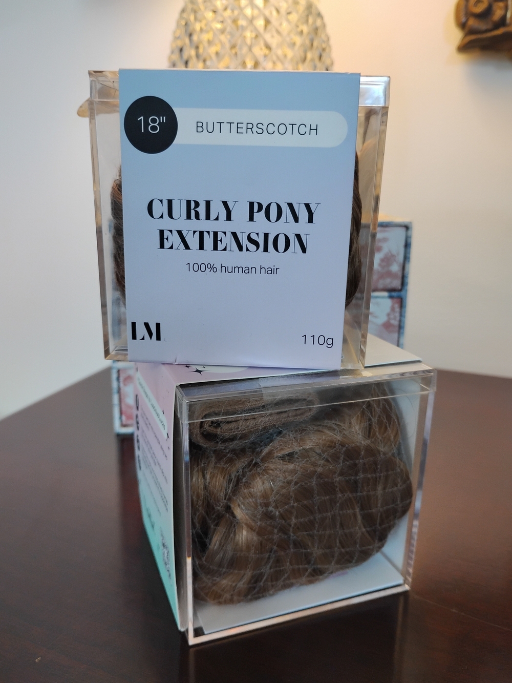 One Butterscotch Curly Pony Extension - 18"